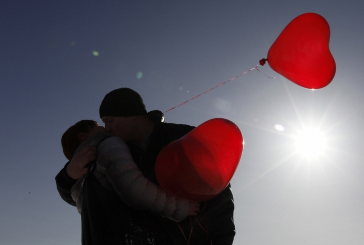 Couples kiss during a flashmob organised by a local television station on the eve of Valentines Day in the southern Russian city of Stavropol. ©REUTERS/Eduard Korniyenko