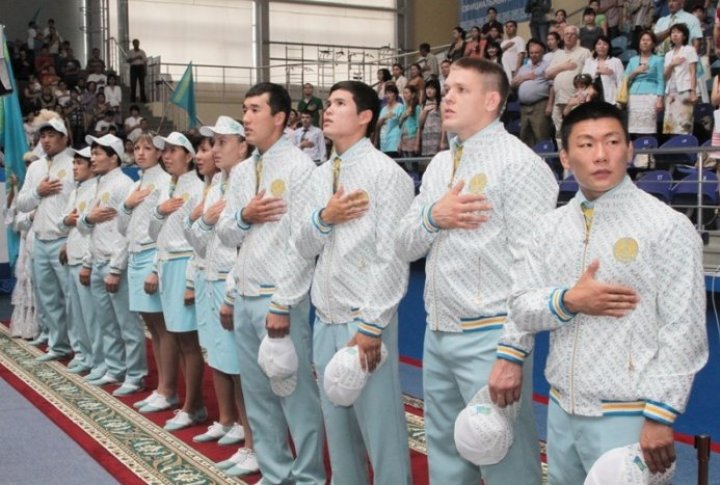 Kazakhstan Olympic team listening to Kazakhstan anthem. Photo by  Danial Okassov©
