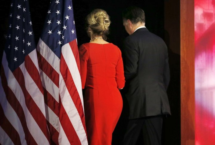 Republican presidential nominee Mitt Romney exits the stage with his wife Ann after he delivered his concession speech during his election night rally in Boston. ©REUTERS/Mike Segar