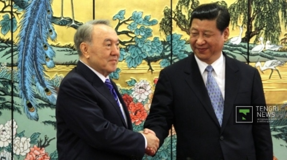President Nursultan Nazarbayev meeting his China’s counterpart Xi Jinping. By Dmitry Khegai 