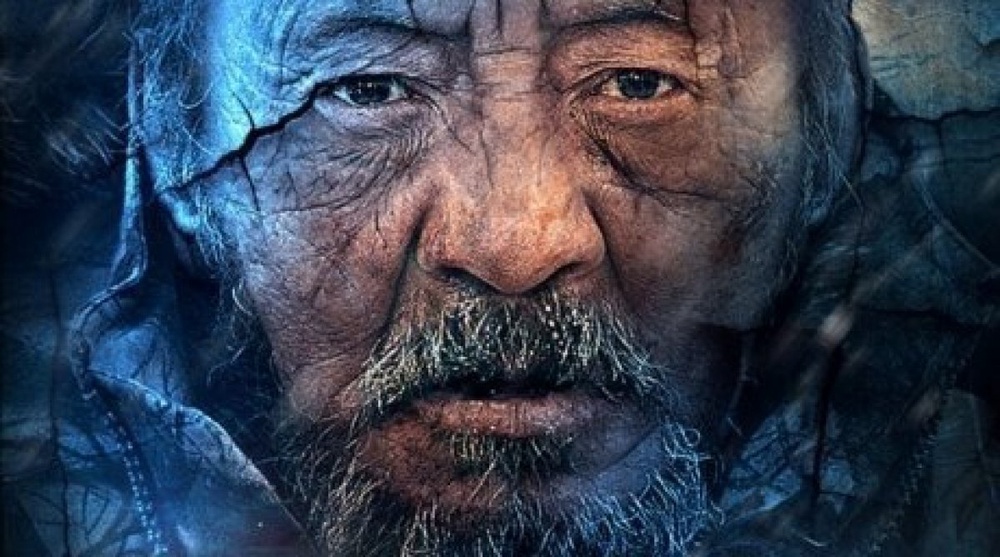Kazakhstan's actor Yerbolat Toguzakov at the poster of Shal movie directed by Yermek Tursunov.