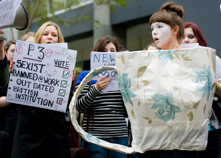 Feminist campaigners protest outside the UK offices of News International in east London. ©AFP