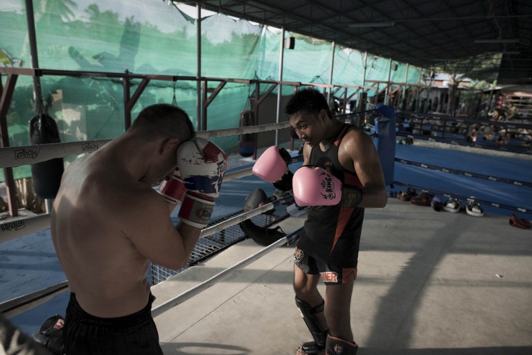 Students training at the Tiger muay Thai & MMA training camp. ©AFP
