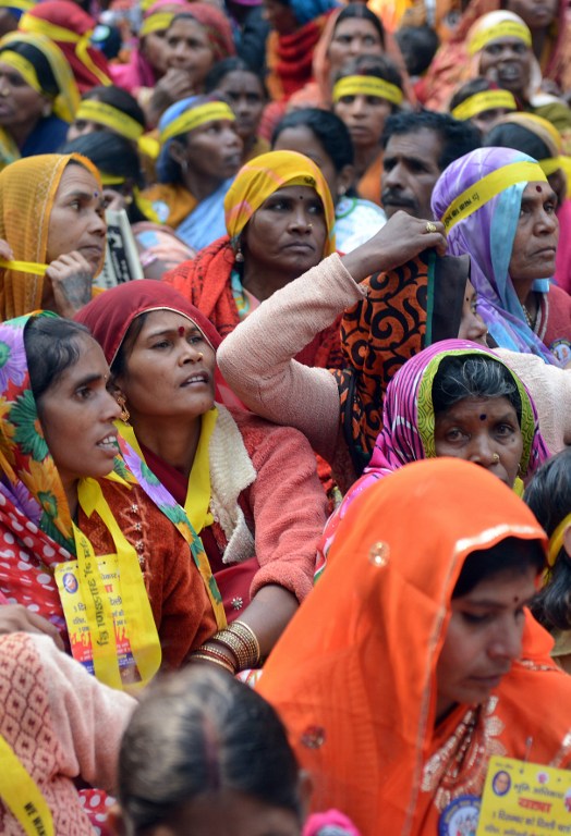 In this file photograph taken on December 6, 2013, Indian women from the 'dalit' or 'lower caste' shout slogans during a Dalit Dignity Rally against the Congress-led UPA government near Parliament House in New Delhi. 