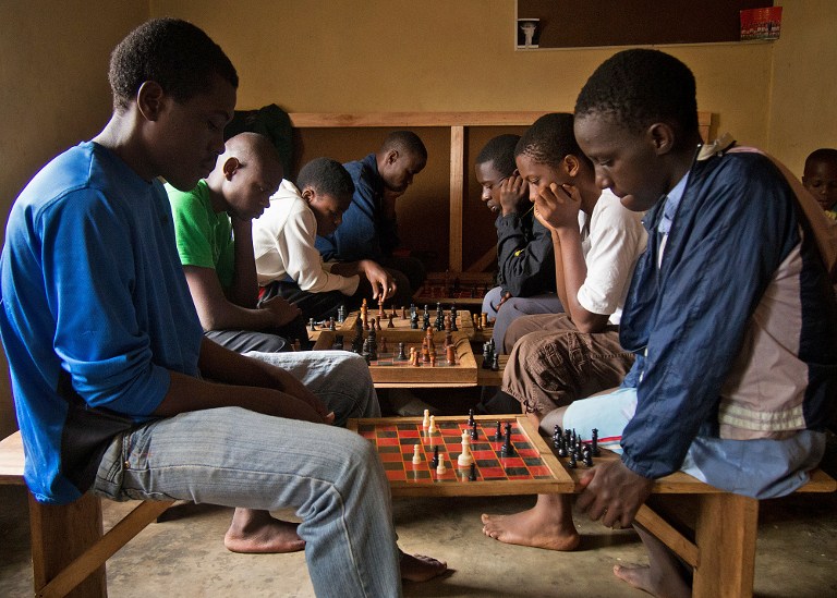 Children play chess at a chess centre in Kampala. ©AFP
