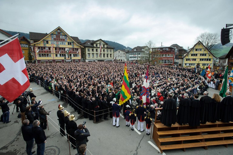 People gathering to vote during the annual Landsgemeinde meeting in the square of the town of Appenzell. ©AFP