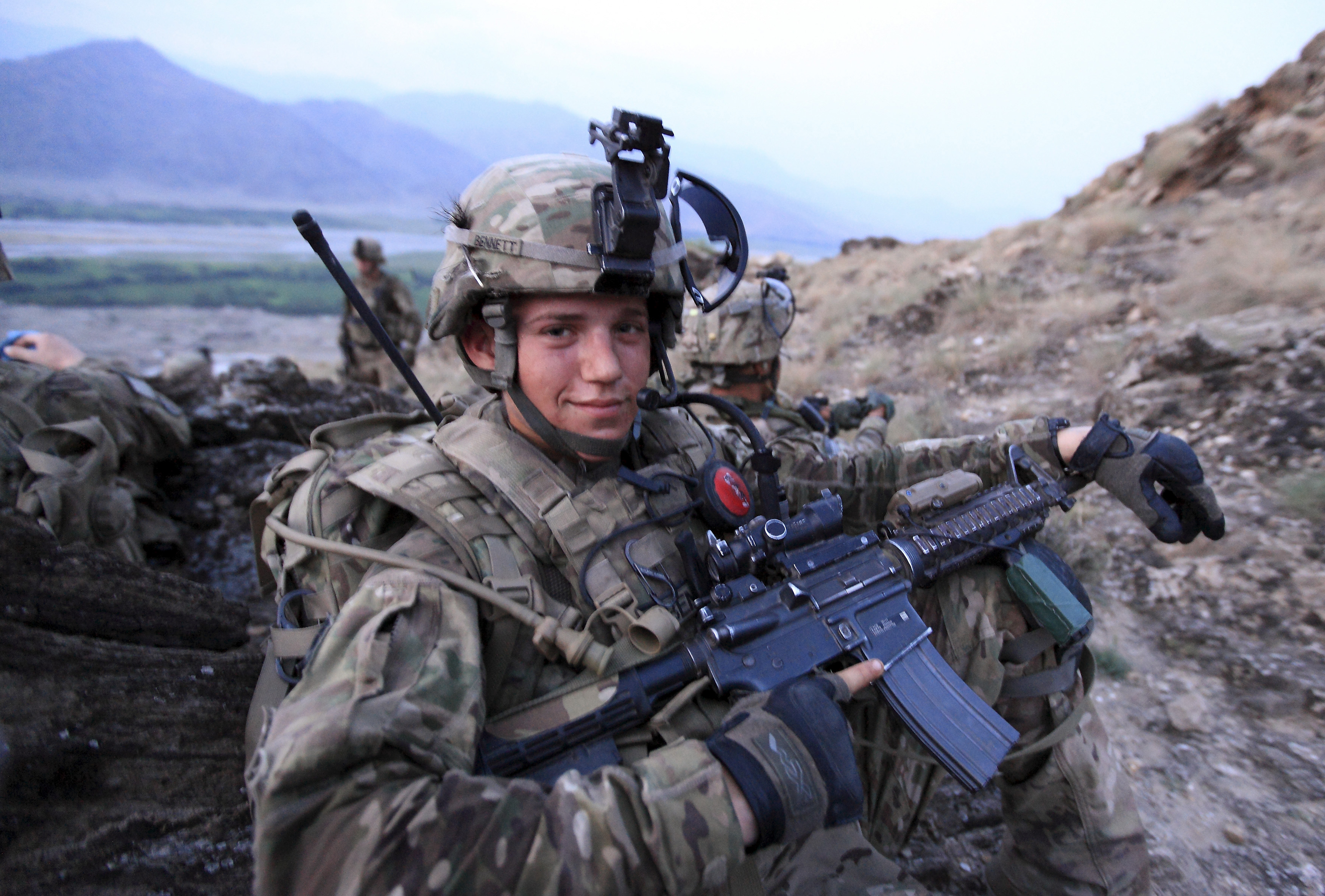 U.S. Army Private Bennett takes a break during an early morning mountain patrol in eastern Afghanistan. ©REUTERS/Nikola Solic