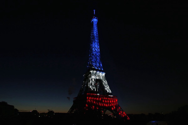 The Eiffel Tower is illuminated before the traditional Bastille Day fireworks display in Paris. ©Reuters