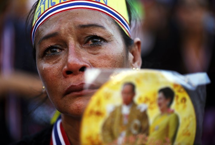 A woman listening to the protest leader Suthep Thaugsuban speech with tears in her eyes near the Democracy monument in Bangkok. ©Reuters