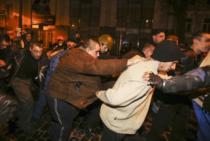 Interior Ministry officers captured by anti-government protestors during clashes with riot police in Kiev. ©Reuters 
