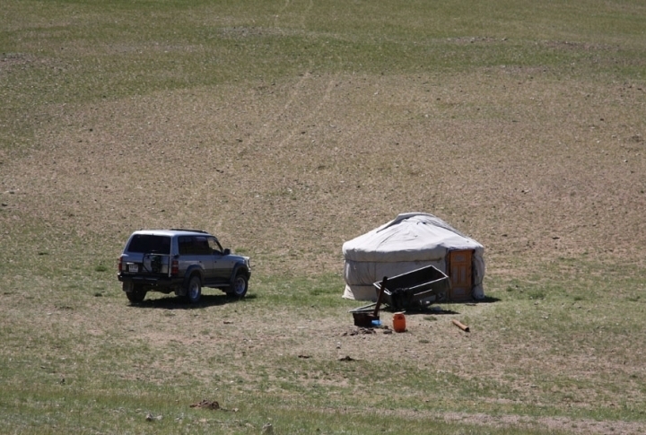 Rich Mongolians prefer a ger to a normal house. Both satellite dish and Japanese jeep look well with the ger on the background. ©Zhuldyz Seisenbekova