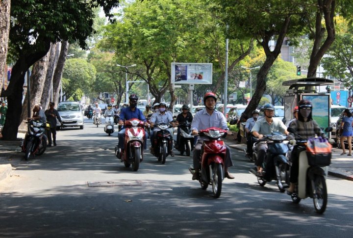 Ho Chi Minh City has  the population of 10 million people and 5 million of them have motor bikes. Photo by Roza Yessenkulova©