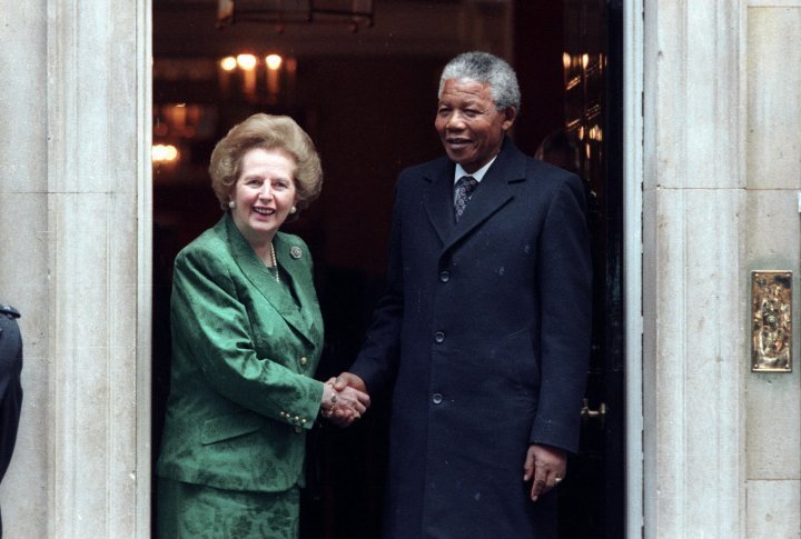 African National Congress leader Nelson Mandela (R) is greeted by British Prime Minister Margarat Thatcher at 10 Downing Street on July 4, 1990. ©REUTERS