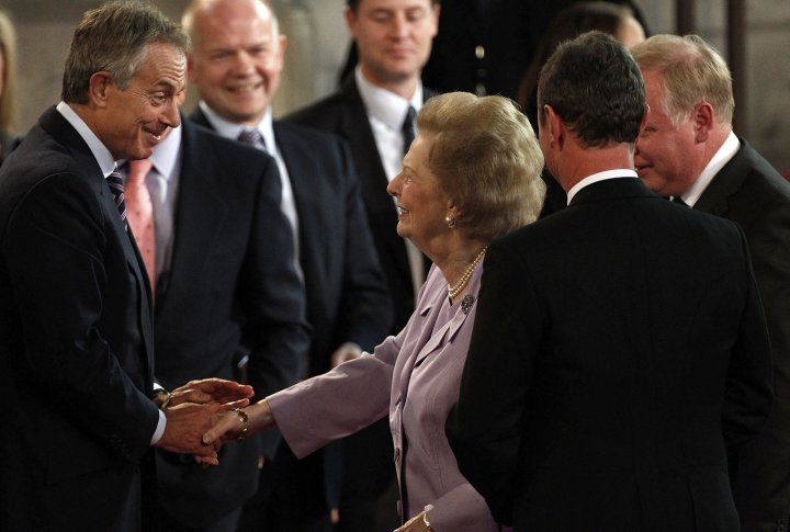 Former British prime ministers Tony Blair (L) and Margaret Thatcher greet each other before the arrival of Pope Benedict at Westminster Hall in London September 17, 2010. ©REUTERS
