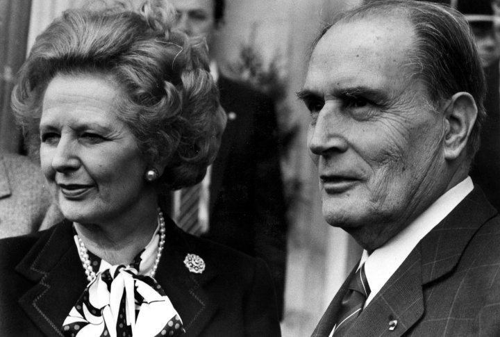 British Prime Minister Margaret Thatcher (L) and French President Francois Mitterrand pose for the media after a meeting about nuclear arms control at the Chateau de Benouville in Normandy, western France, March 23, 1987. ©REUTERS