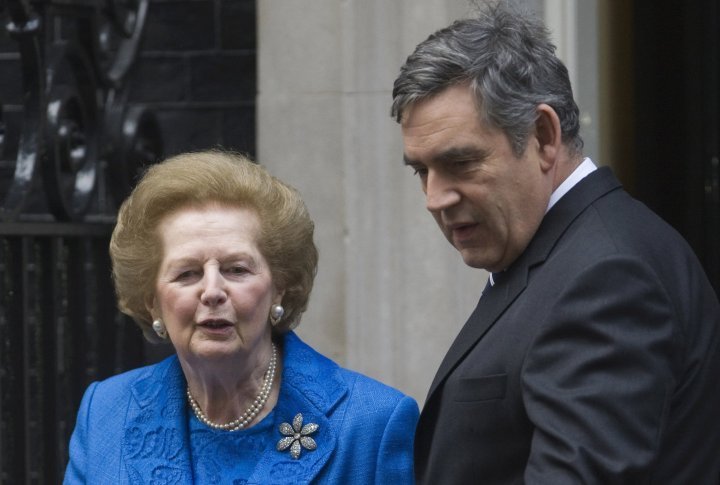 74th Britain's Prime Minister Gordon Brown (R) accompanies former Prime Minister Margaret Thatcher as she leaves 10 Downing Street in London November 23, 2009. ©REUTERS 