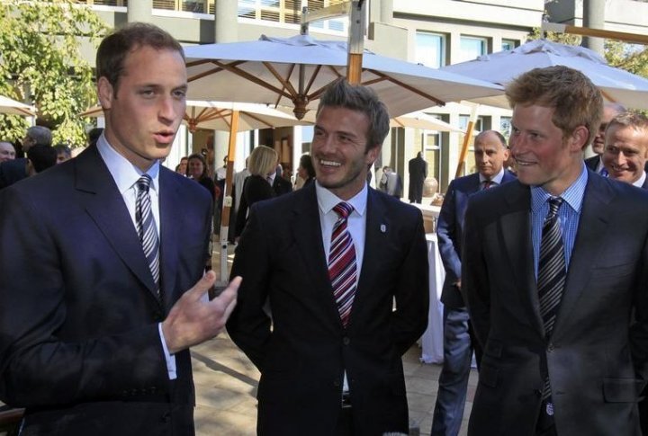 Britain's Princes William (L), Harry and David Beckham (C). ©REUTERS/Radu Sigheti
