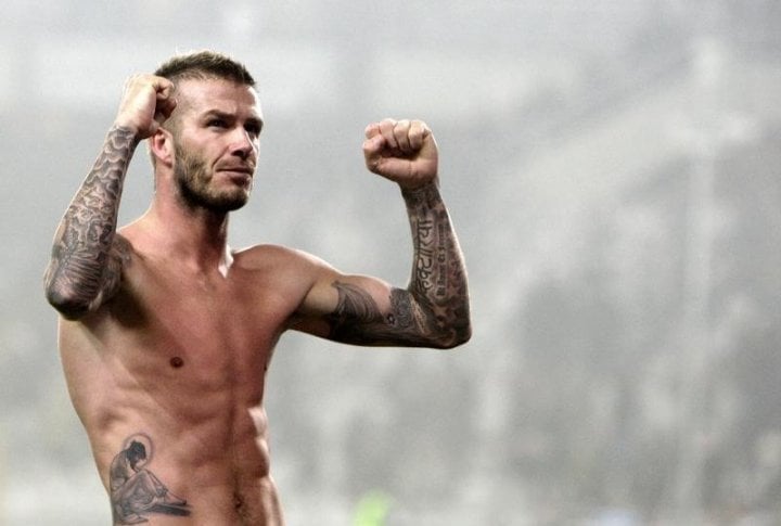 AC Milan David Beckham celebrates at the end of the match against Juventus. ©REUTERS/Stefano Rellandini