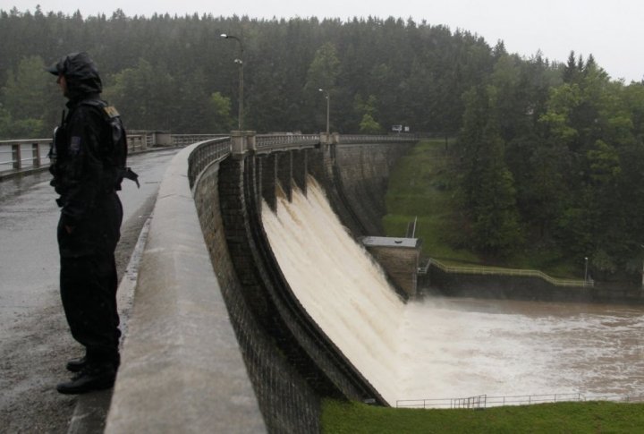 A policeman stands by the Husinec Dam in south Bohemia. ©REUTERS