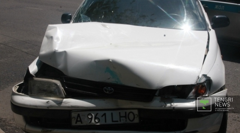 Damaged car at the accident site. Photo by Chingiz Dzhumagulov© 