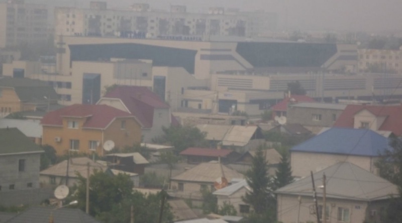 Pavlodar covered with smog. Tengrinews.kz stock photo