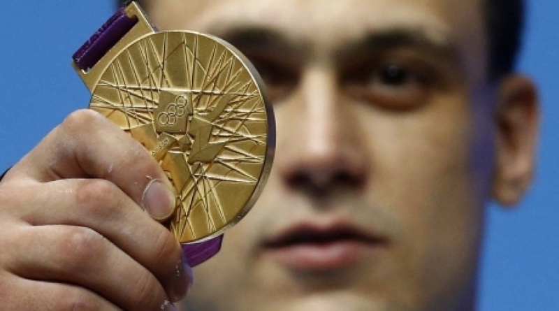 Ilya Ilyin's Olympic gold medal. ©REUTERS