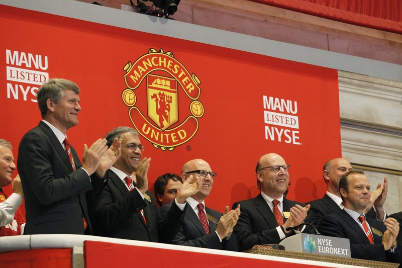 Manchester United executives and owners ring the opening bell at the NY Stock Exchange. ©REUTERS/Brendan McDermid