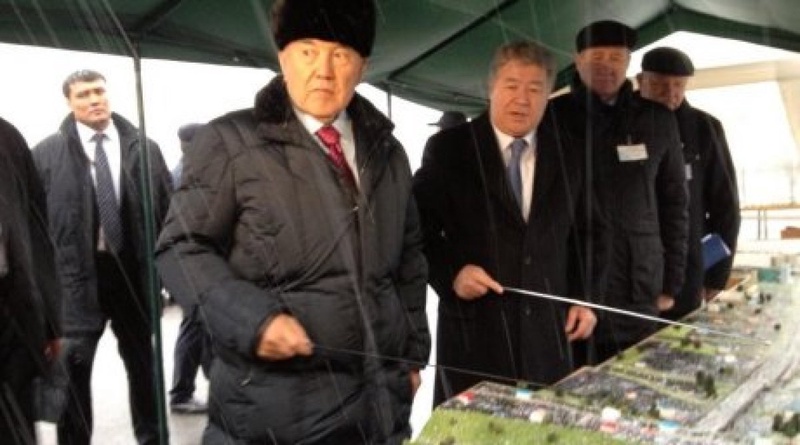 lmaty Akim (Mayor) Akhmetzhan Yessimov introduced Nazarbayev with model of constructed junctions. Photo by Roza Yessenkulova©