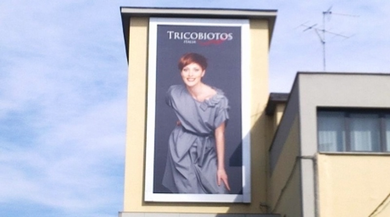 Tricobiotos promotional buliding in Italy. Copying is prohibited