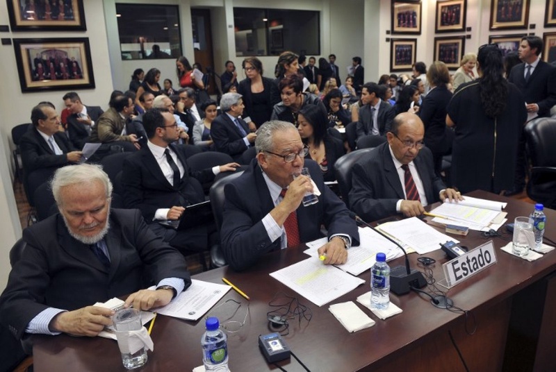 Representatives for Veenzuela, lawyers Luis Britto (L), German Saltron (C) and Manuel Galindo attend the public hearing for the case Brewer Carias vs Venezuela in the Inter-American Court of Human Rig