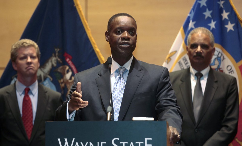 Detroit Emergency Manager Kevyn Orr (C) addresses the media during a news conference to detail the more than $300 million aid package for Detroit. ©Reuters/Rebecca Cook 