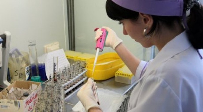 Laboratory technician checking blood for HIV antibodies. ©RIA Novosti