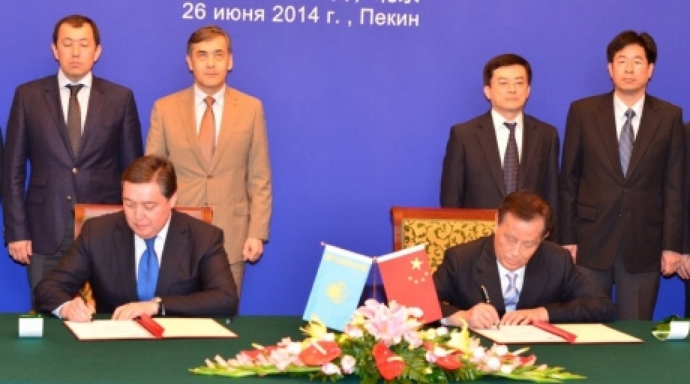 The meetings resulted in signing of a protocol © Press Service of Kazakhstan Temir Zholy