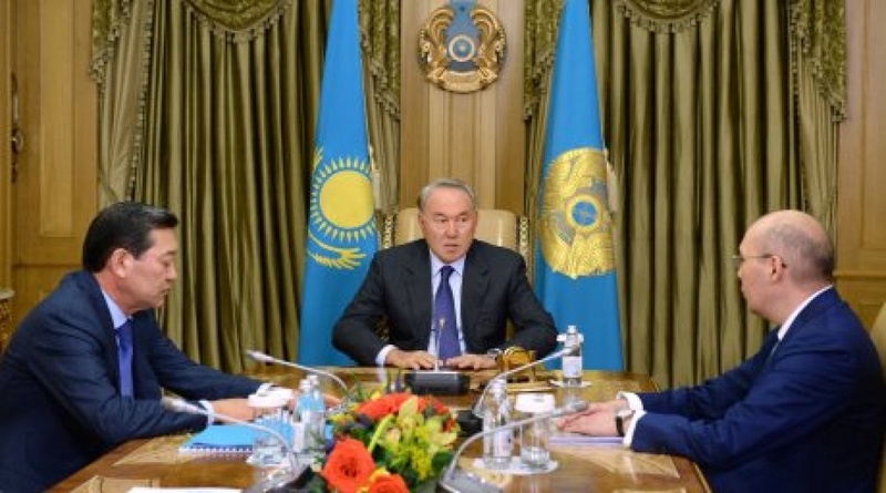 Kazakhstan's President Nursultan Nazarbayev meets with Prime-Minister Serik Alhmetov and the Head of National Bank Kairat Kelimbetov. Photo courtesy of akorda.kz