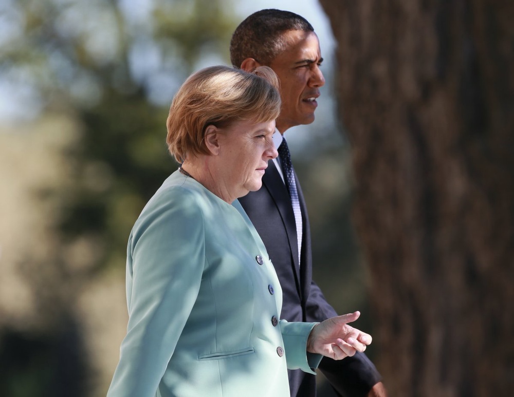German Chancellor Angela Merkel (L) and U.S. President Barack Obama. 
©Reuters/Anton Denisov