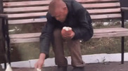 Man shares his last meal with a stray cat and goes viral