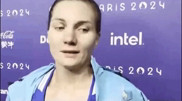 Kazakh boxer’s flag peels off during interview