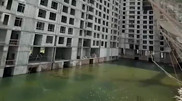 Criminal case opened after courtyard of unfinished Astana residential complex floods